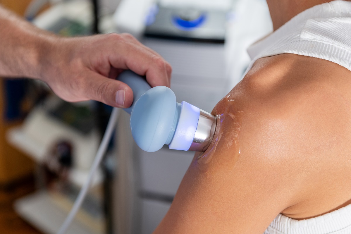 ultrasound therapy on a patients shoulder